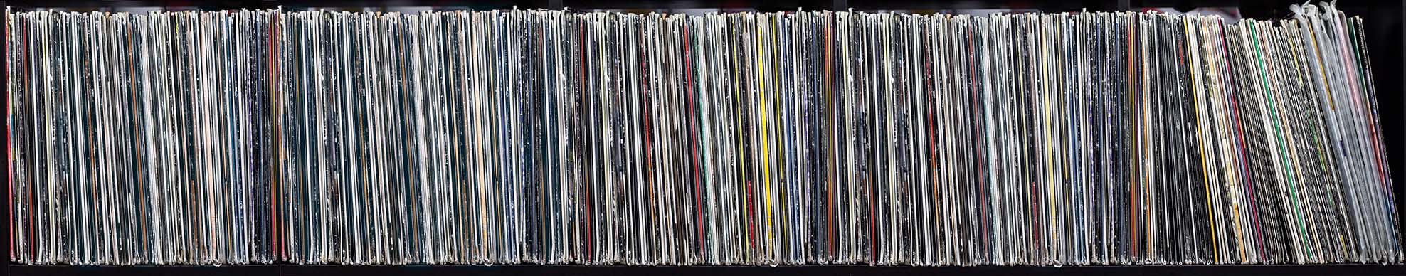 Vinyl records, books, tickets, and memorabilia from an estate